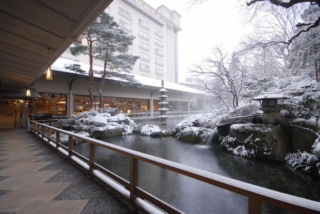 Suimeikan Gero Esterno foto A view of the outdoor onsen at the hotel